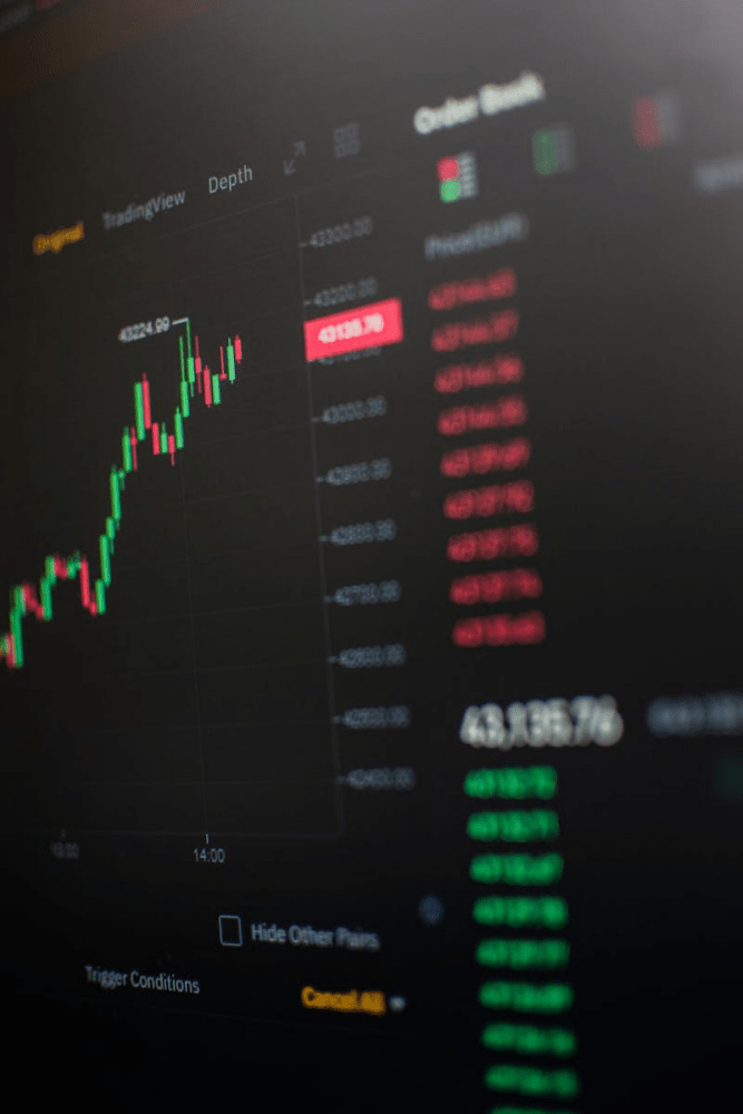 Close-up view of a cryptocurrency trading screen showing market trends and data.